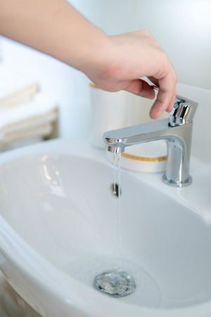 How to Clean a Bathroom Sink Drain Naturally and Easily Image